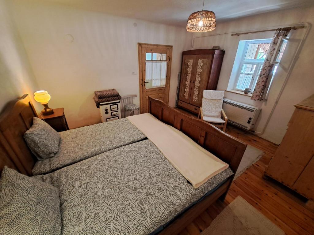 Postel nebo postele na pokoji v ubytování Maryland Vendégház