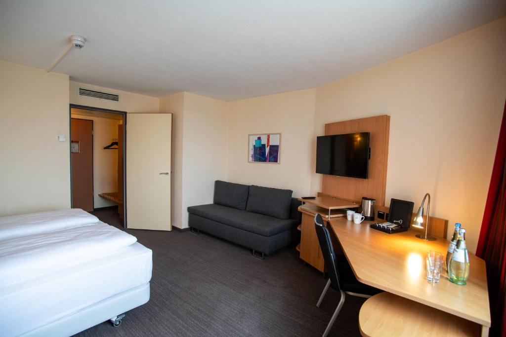 SleepBEEONE AIRPORTHOTEL FRANKFURT MÖRFELDEN - Klassieke Drievoudige Kamer
