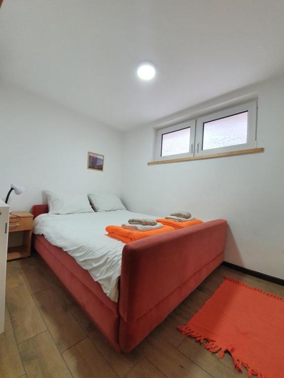 Postel nebo postele na pokoji v ubytování Apartmani Milutinovic