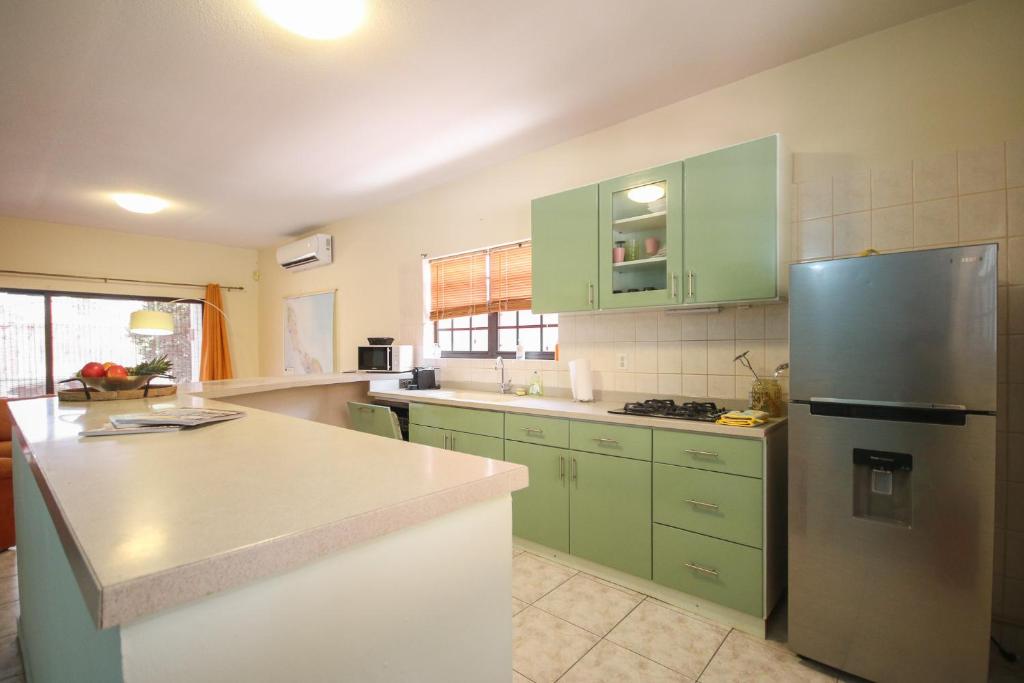 Kuchyň nebo kuchyňský kout v ubytování Woodstock Palmresort Curaçao