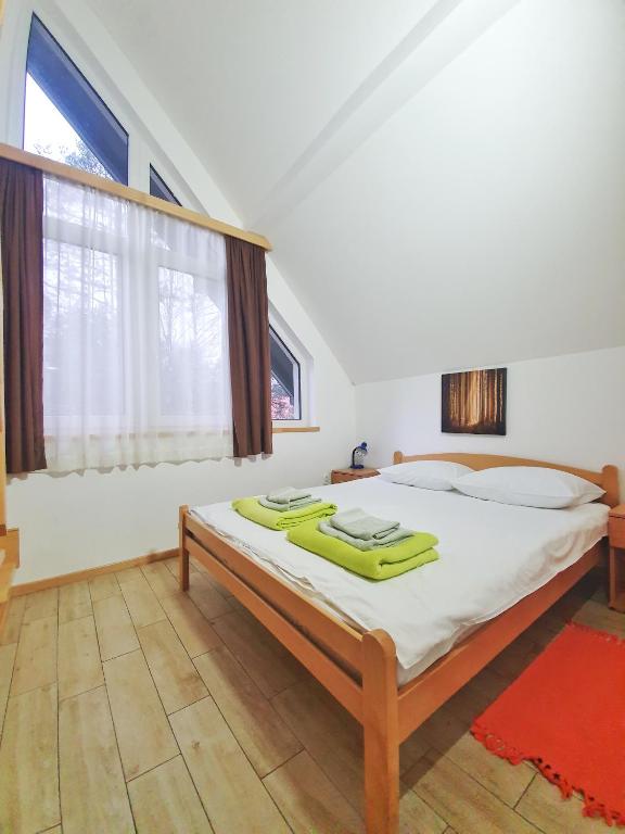 Postel nebo postele na pokoji v ubytování Apartmani Milutinovic