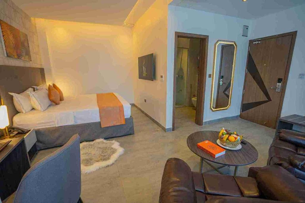 Postel nebo postele na pokoji v ubytování Baraka Tower Hotel