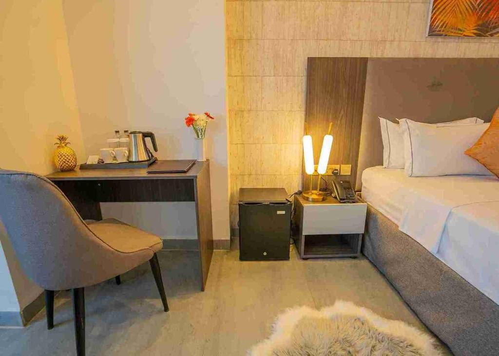 Postel nebo postele na pokoji v ubytování Baraka Tower Hotel