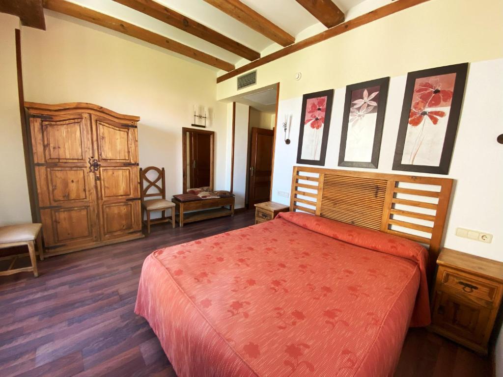 Postel nebo postele na pokoji v ubytování HOTEL EL RASTRO - Palacio Duque de Tamames -