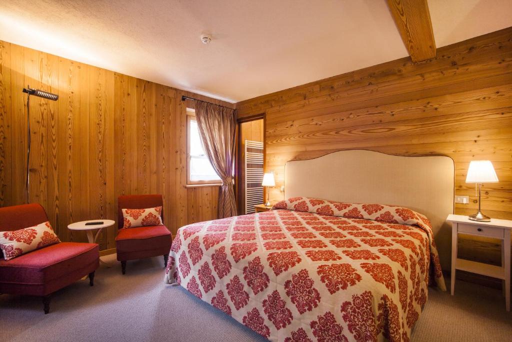Postel nebo postele na pokoji v ubytování Hotel Ruitor