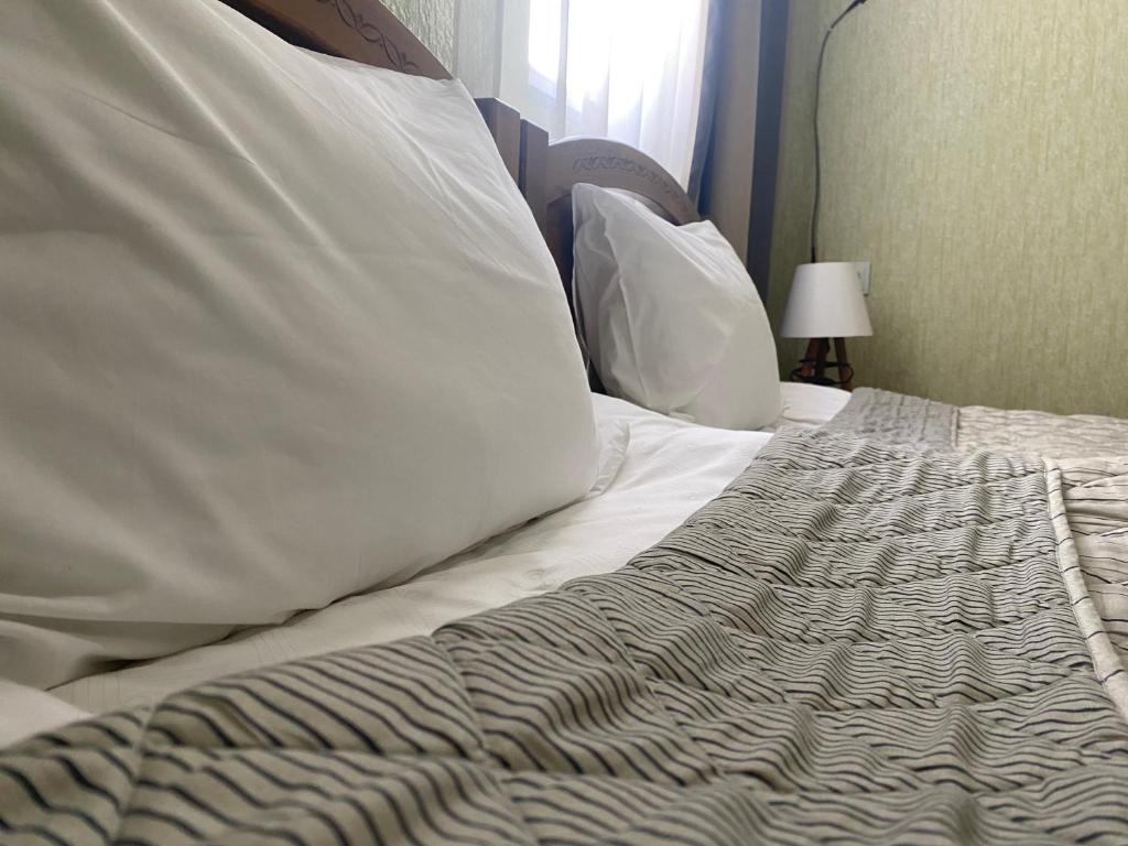 Postel nebo postele na pokoji v ubytování Hillside Guesthouse