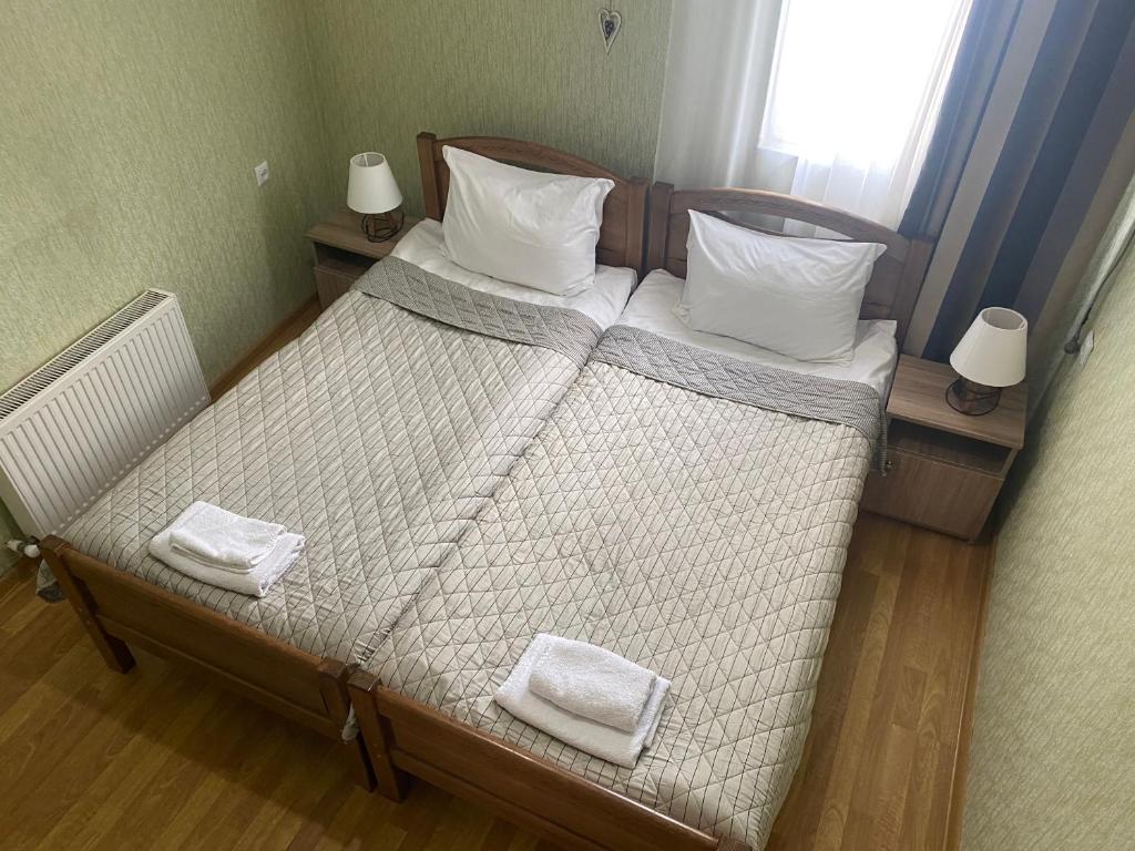 Postel nebo postele na pokoji v ubytování Hillside Guesthouse