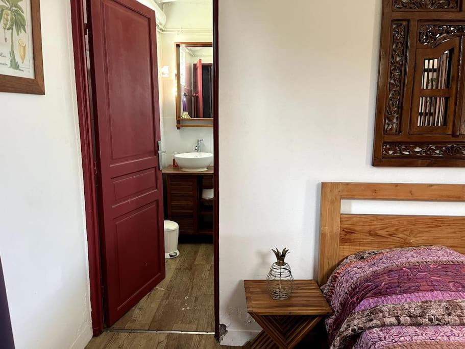 Postel nebo postele na pokoji v ubytování Le jardin des B-joux