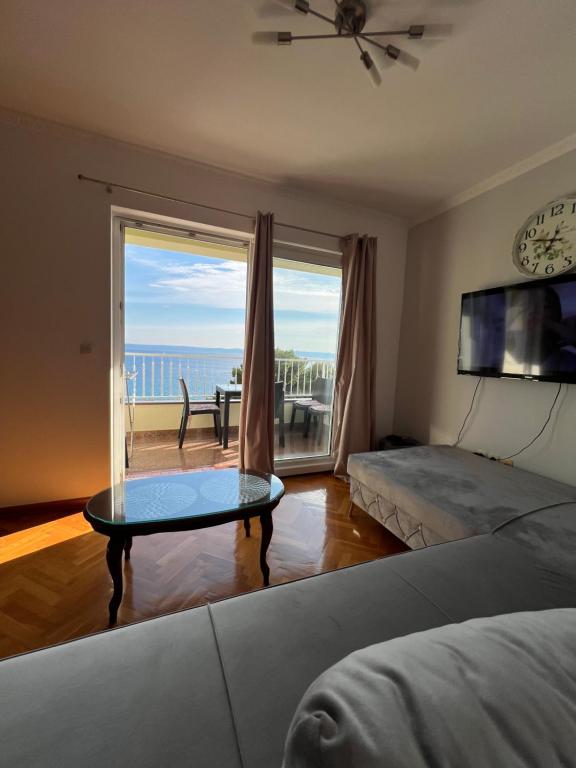 Ένα ή περισσότερα κρεβάτια σε δωμάτιο στο Apartman KING