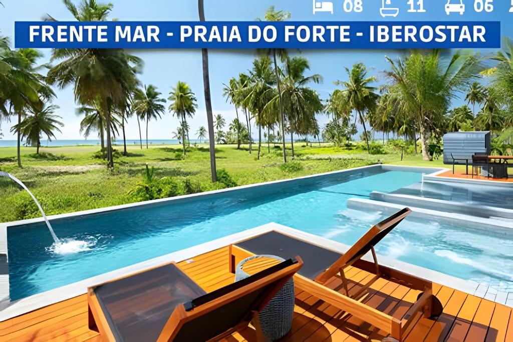 Hồ bơi trong/gần Mansão Frente Mar 8 Suítes em Praia do Forte