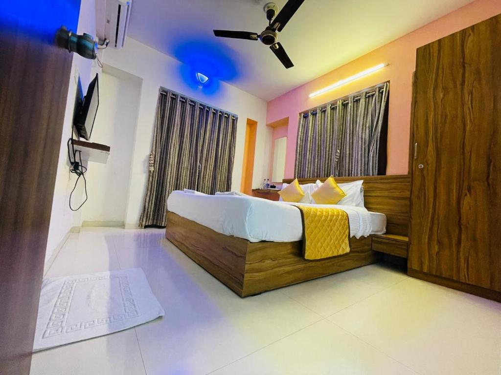 Postel nebo postele na pokoji v ubytování Habitat Inn