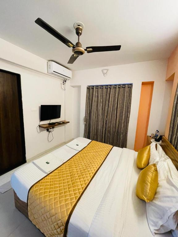Postel nebo postele na pokoji v ubytování Habitat Inn