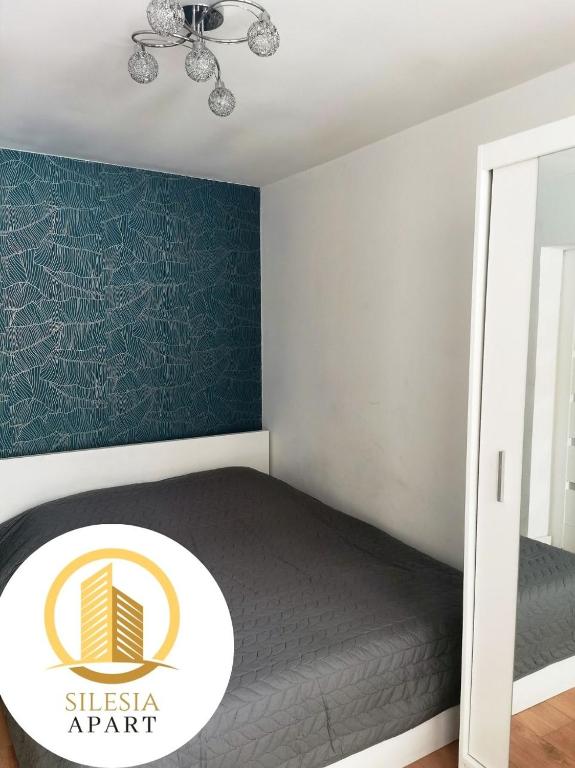 Postel nebo postele na pokoji v ubytování Apartament Lancelot