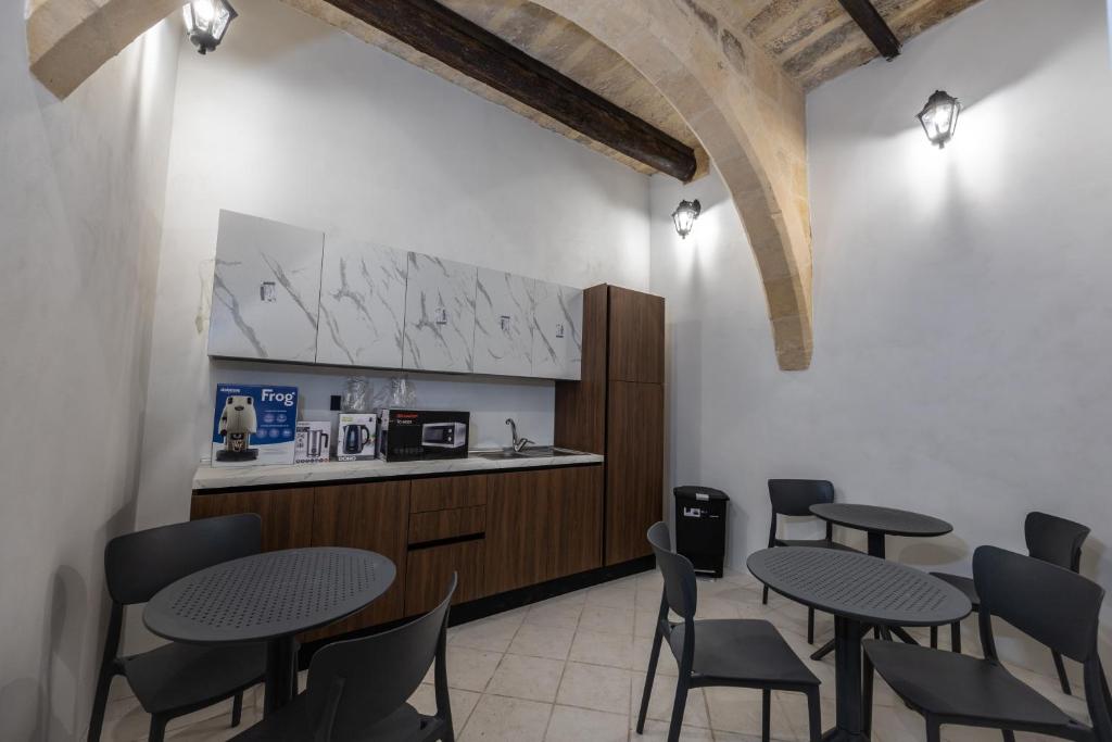 Kuchyň nebo kuchyňský kout v ubytování Matilde Valletta Suites