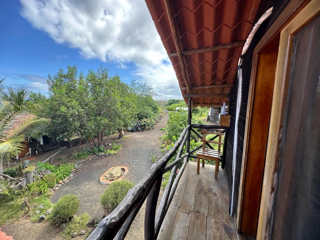 a balcony of a house with a view of a road at El Pajas in Puerto Velasco Ibarra