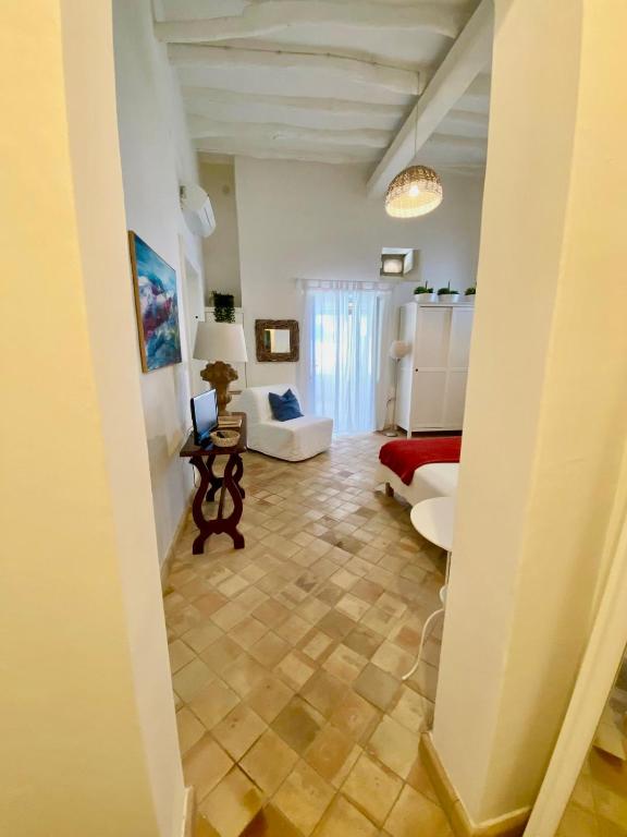 Televízia a/alebo spoločenská miestnosť v ubytovaní Villa Euribia