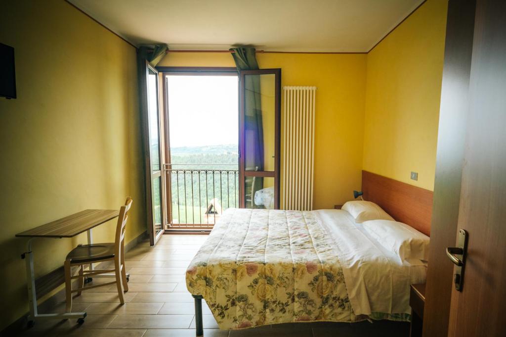 Postel nebo postele na pokoji v ubytování Fortezza