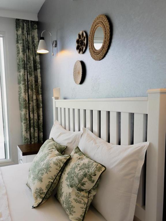 Кровать или кровати в номере Kıyı Hotel Selimiye