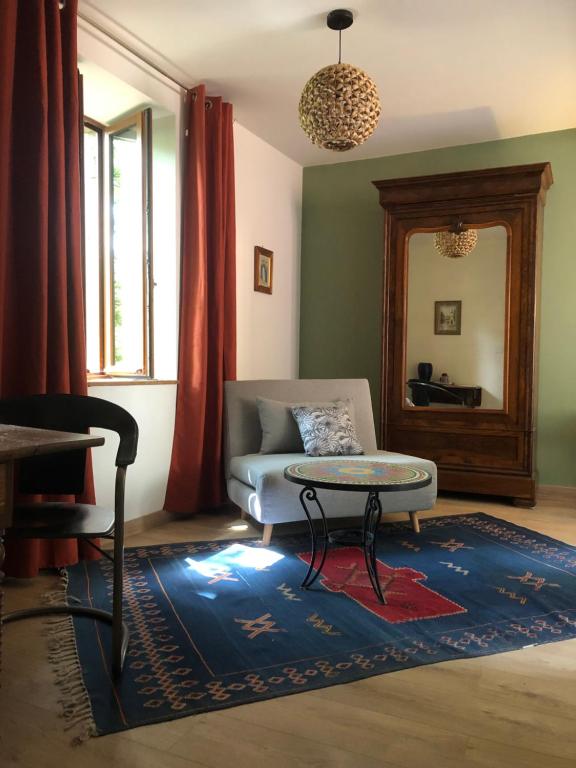 Posezení v ubytování Chambre sur une ile