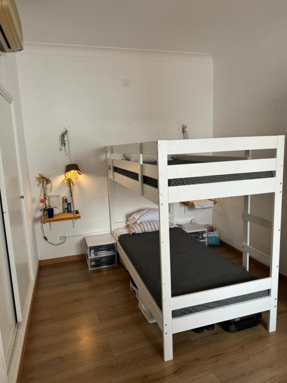 a bedroom with two bunk beds in a room at Casa da Moura in Moura