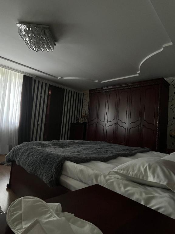 Postel nebo postele na pokoji v ubytování Guest House Misho