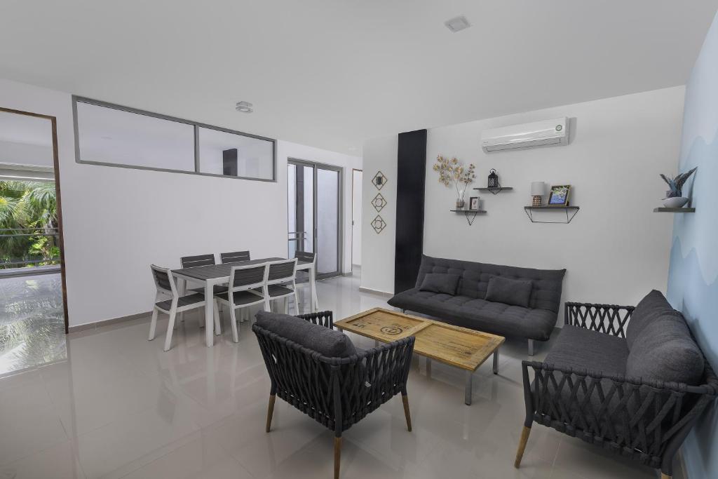 Angelina 28 Beachfront and Family Apartments - Modern and Relaxing Long Stays - 20 min from Cancun Airport - 花园景两卧室公寓