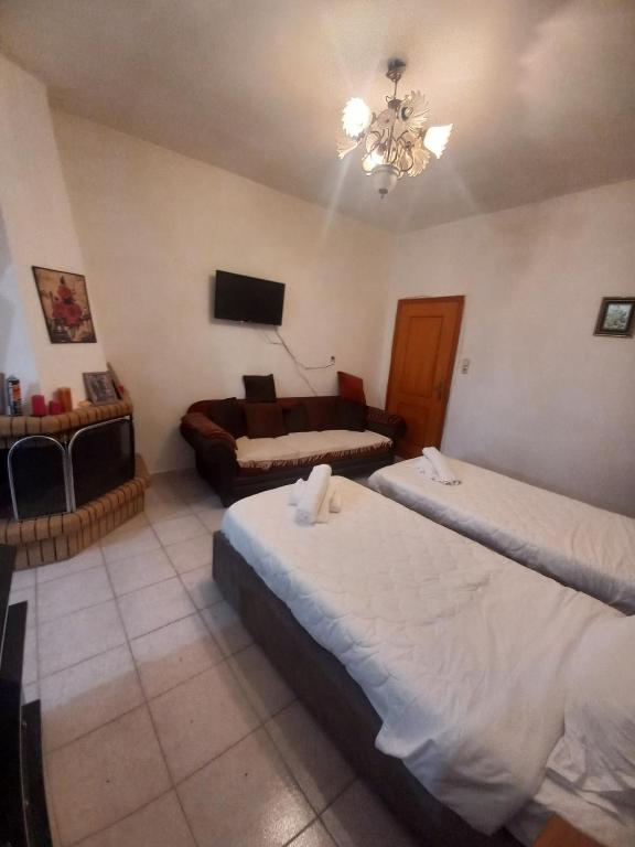 Postel nebo postele na pokoji v ubytování Aleko Guest House