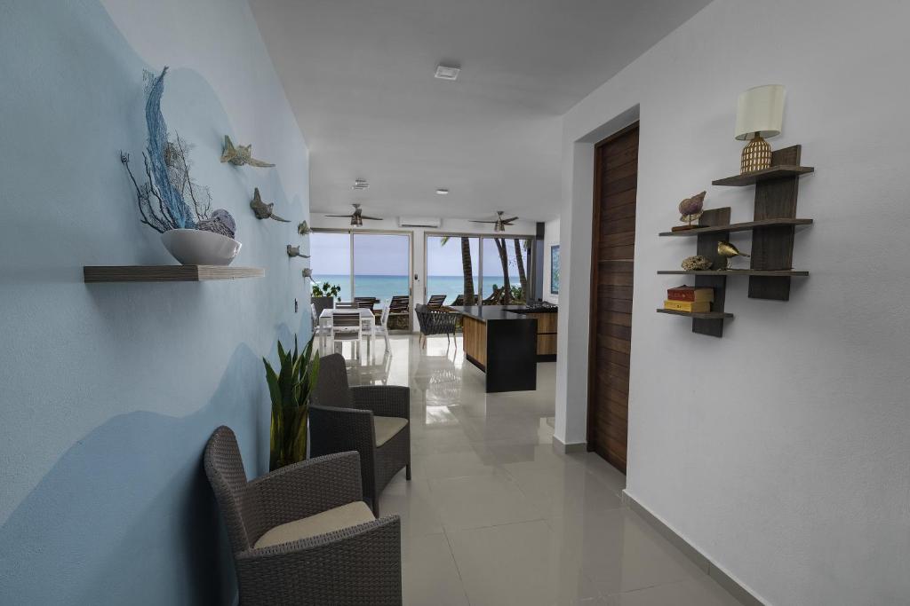 Angelina 28 Beachfront and Family Apartments - Modern and Relaxing Long Stays - 20 min from Cancun Airport - Appartement Met 2 Slaapkamers En Uitzicht Op Zee