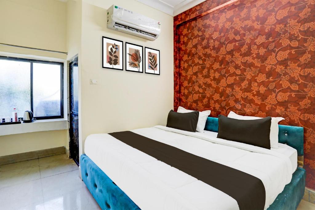 Katil atau katil-katil dalam bilik di OYO Hotel Mid Town