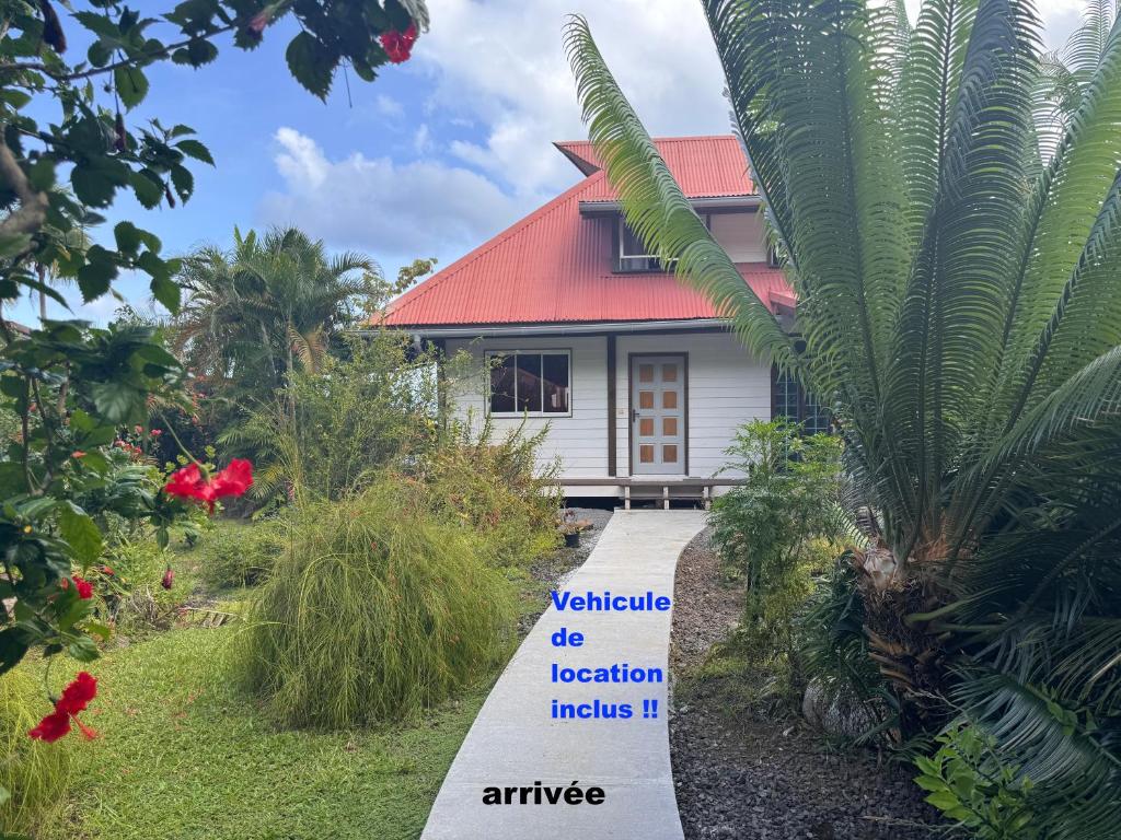 Vrt pred nastanitvijo SofPat Plage Raiatea