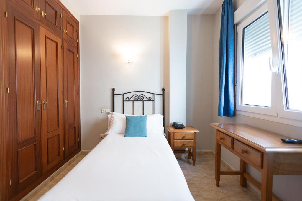 Postel nebo postele na pokoji v ubytování Hotel Mediterráneo by Croma
