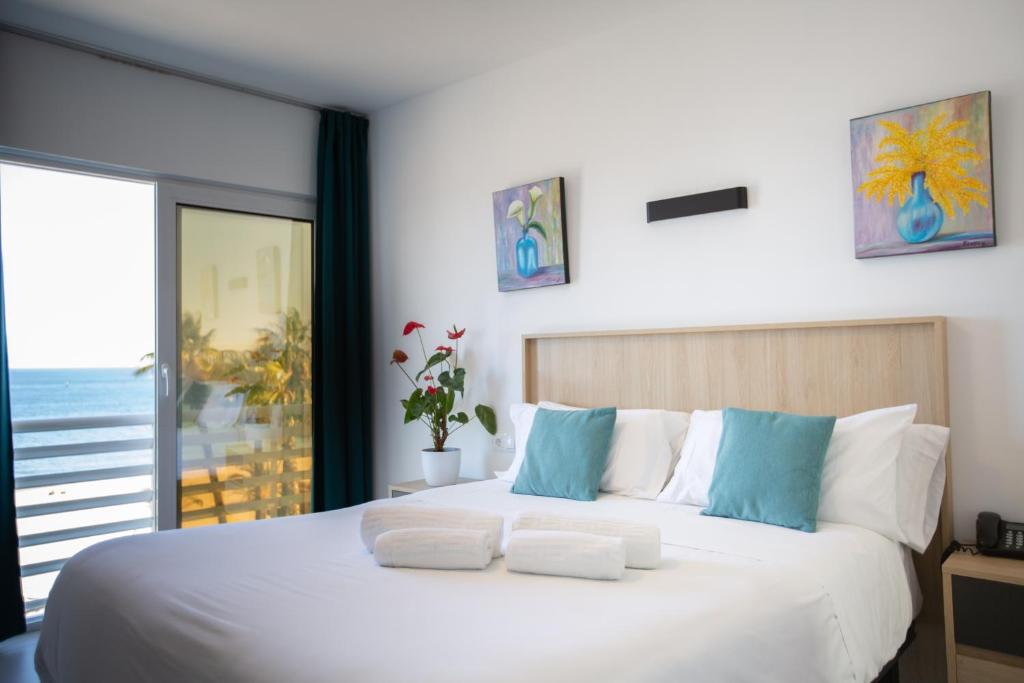 Postel nebo postele na pokoji v ubytování Hotel Mediterráneo by Croma