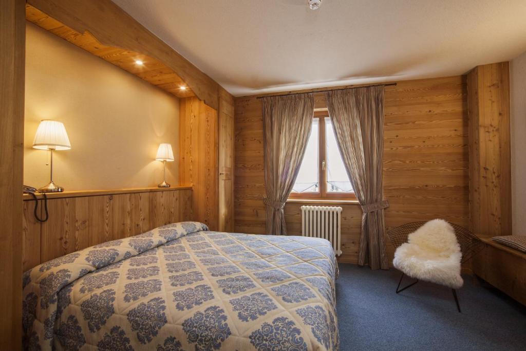 Postel nebo postele na pokoji v ubytování Hotel Ruitor
