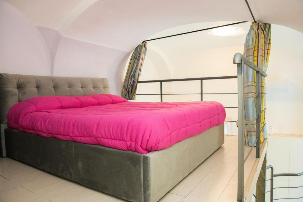 Ένα ή περισσότερα κρεβάτια σε δωμάτιο στο Casetta Mimma - Ischia Ponte