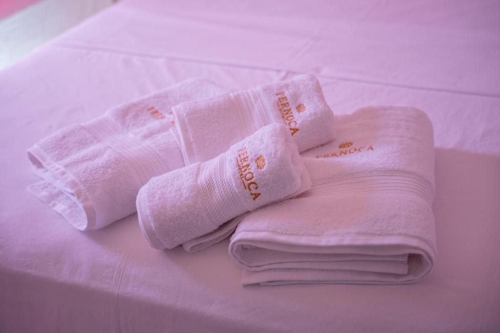 Postel nebo postele na pokoji v ubytování Hotel Pernoca