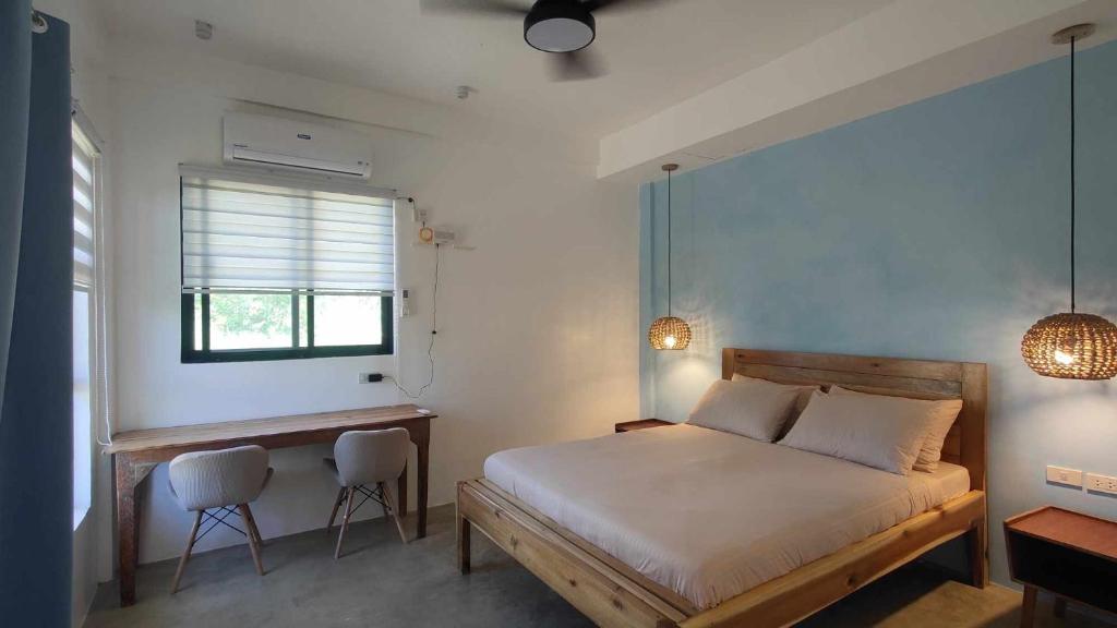 Postel nebo postele na pokoji v ubytování Nephthys homestay