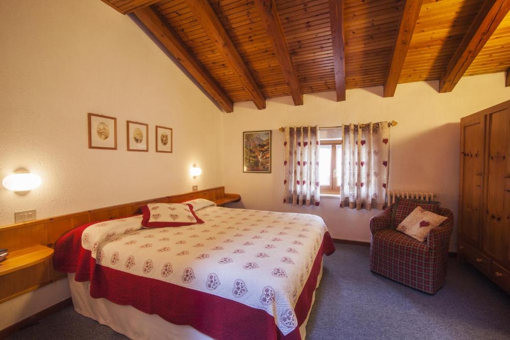 Postel nebo postele na pokoji v ubytování Hotel Ruitor