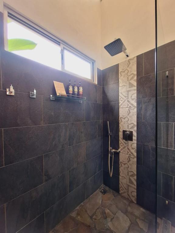 Koupelna v ubytování Alloro Jungle Villas