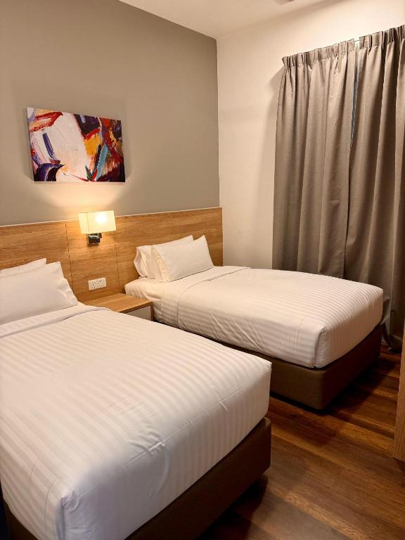 Postel nebo postele na pokoji v ubytování Sunway Onsen Suite