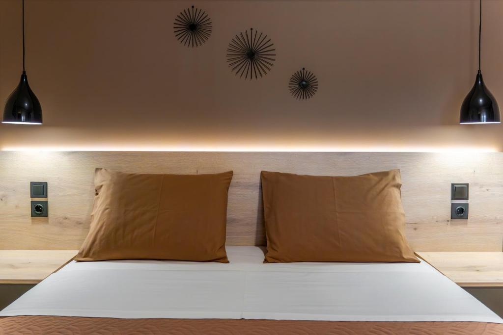 Posteľ alebo postele v izbe v ubytovaní NOVOS guesthouse Meteora