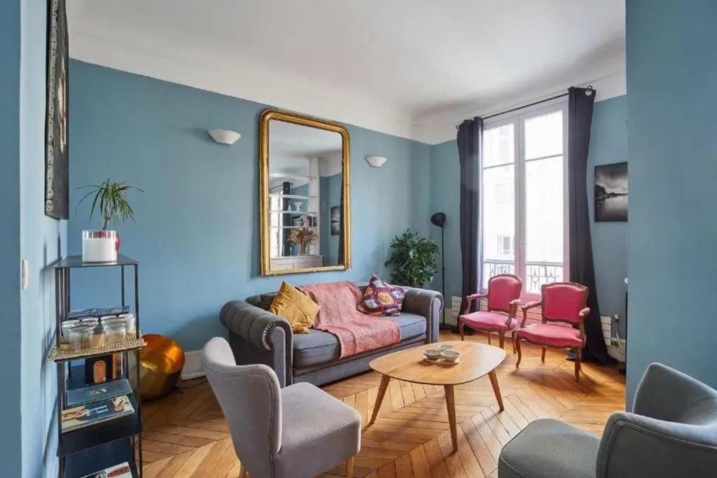 Appartement d'une chambre avec vue sur la ville et wifi a Paris tesisinde bir oturma alanı