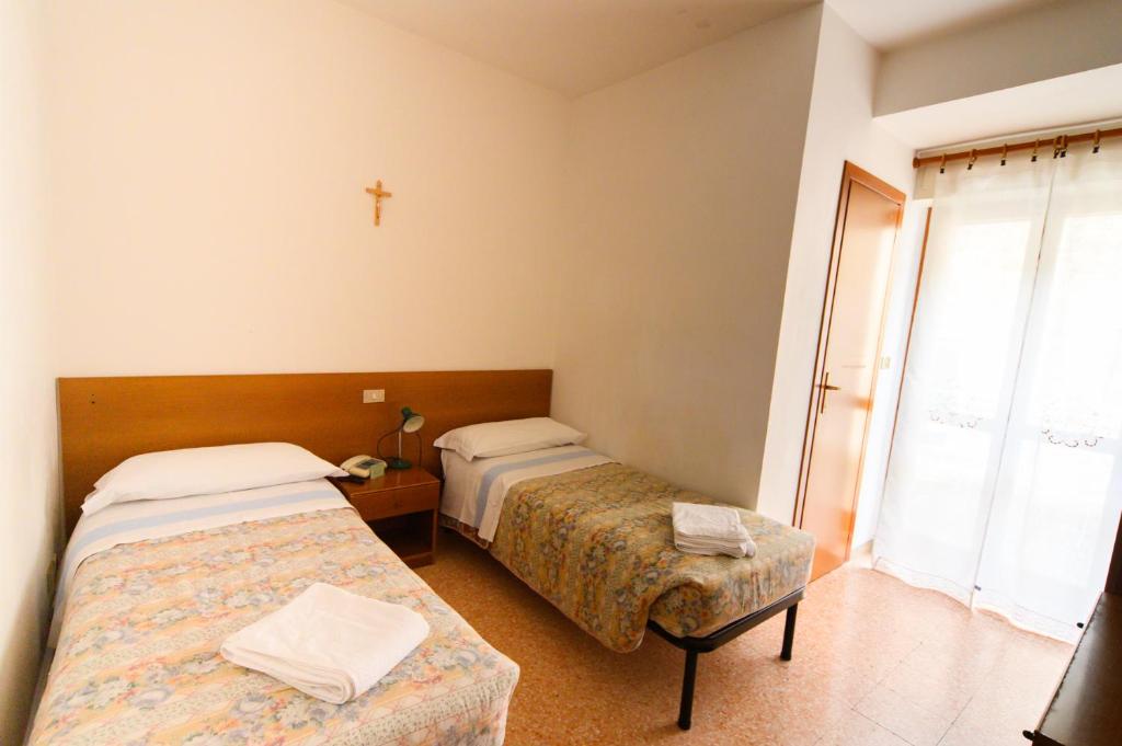 Postel nebo postele na pokoji v ubytování Fortezza