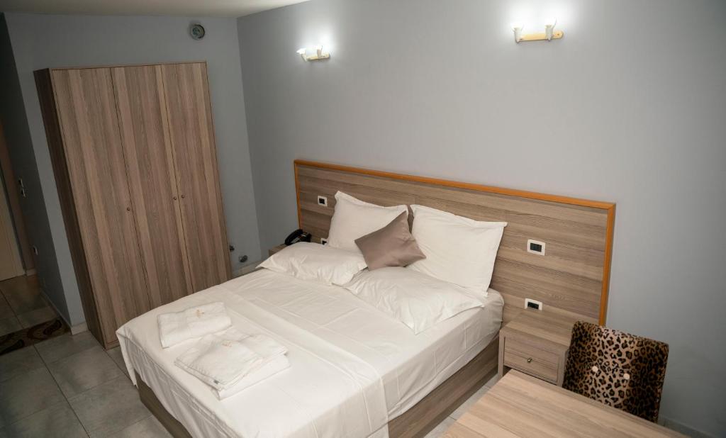 Postel nebo postele na pokoji v ubytování Hotel Pernoca