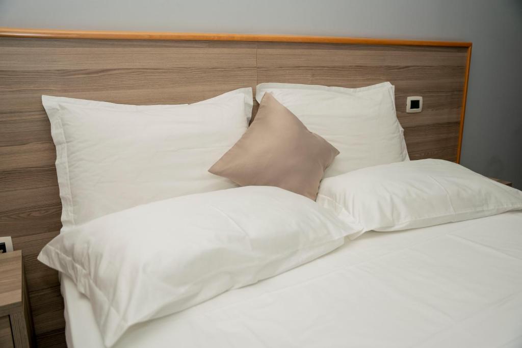 Postel nebo postele na pokoji v ubytování Hotel Pernoca