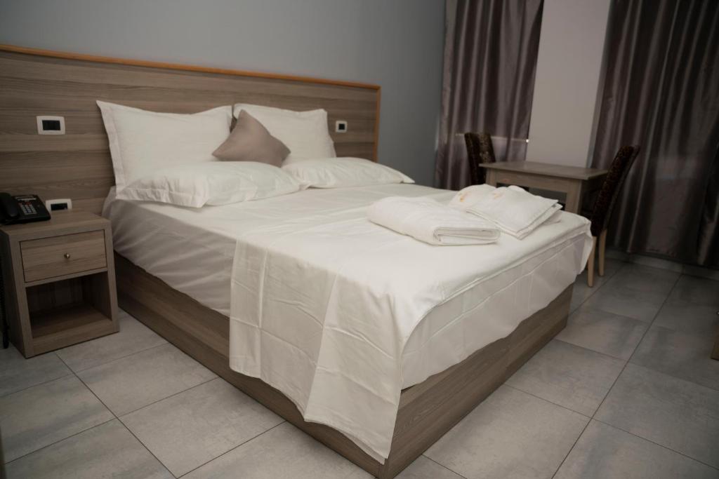 Postel nebo postele na pokoji v ubytování Hotel Pernoca