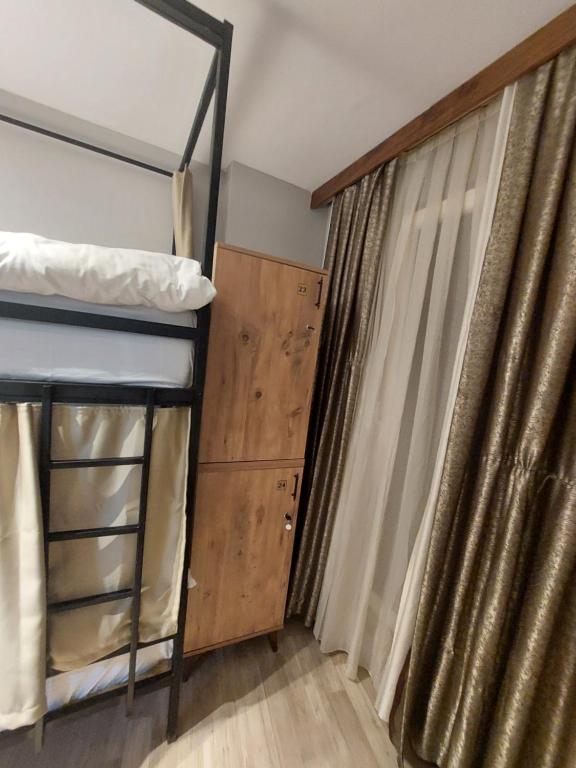 Postel nebo postele na pokoji v ubytování Moon Hostel