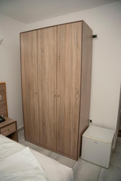 Postel nebo postele na pokoji v ubytování Hotel Pernoca