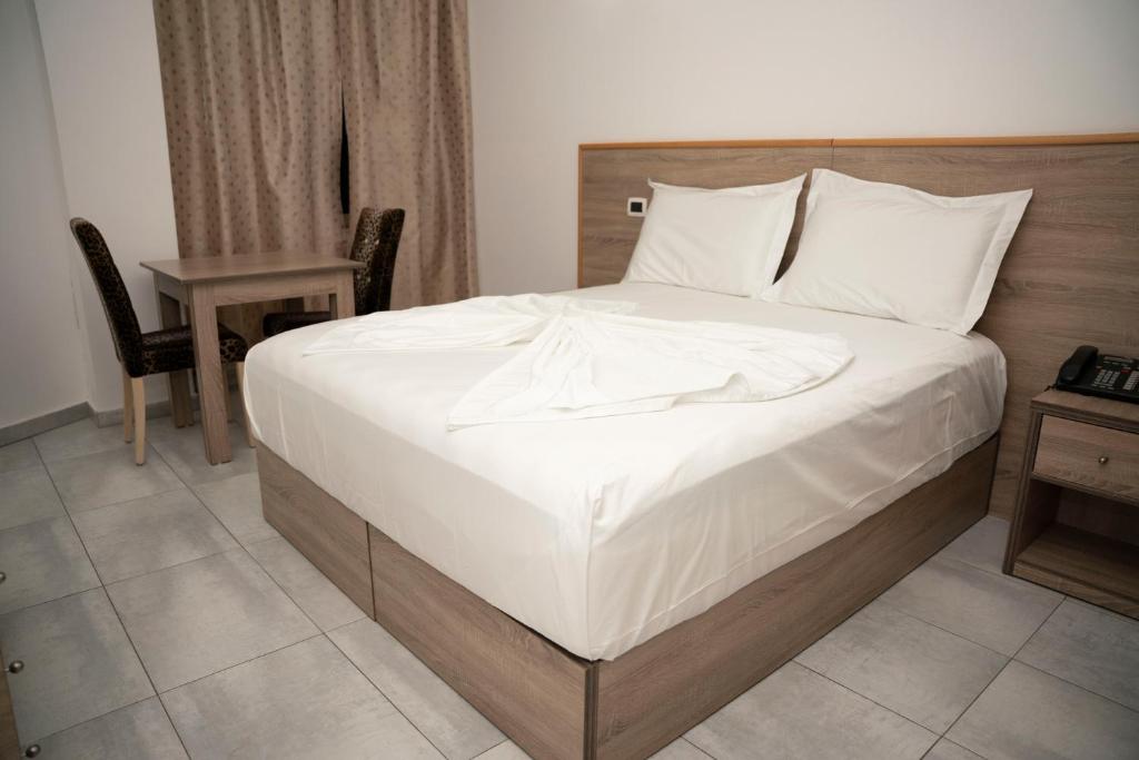 Postel nebo postele na pokoji v ubytování Hotel Pernoca
