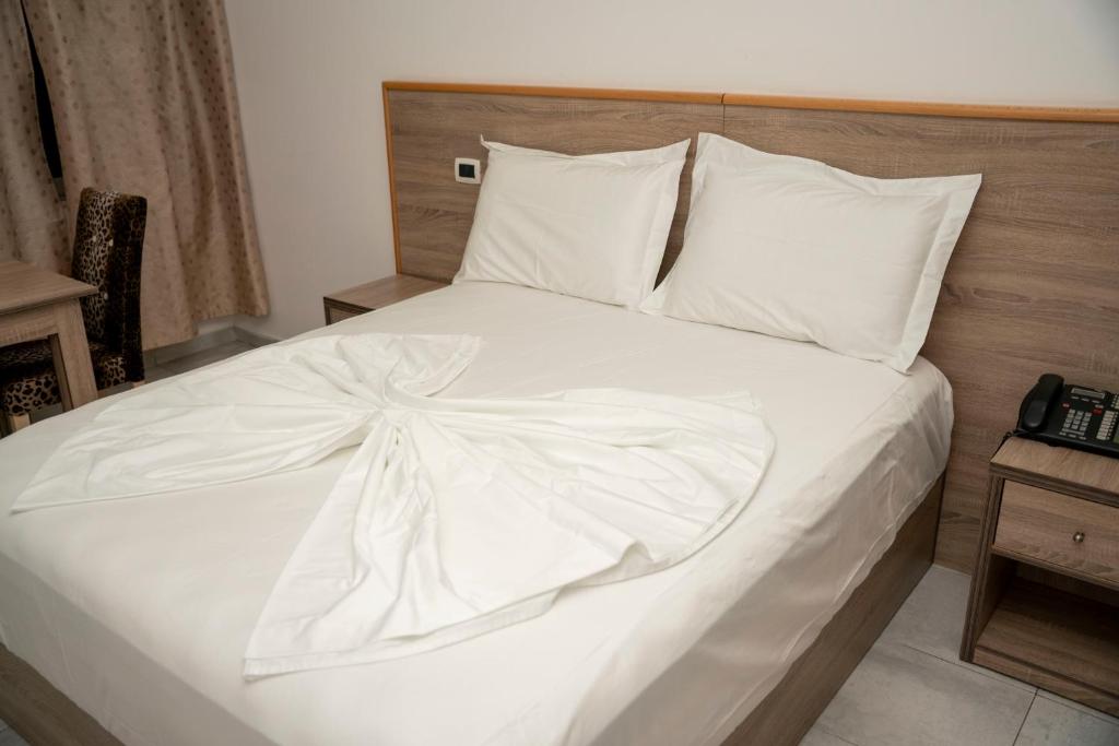 Postel nebo postele na pokoji v ubytování Hotel Pernoca