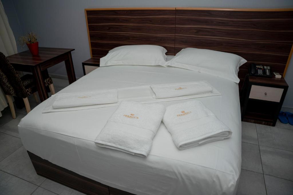 Postel nebo postele na pokoji v ubytování Hotel Pernoca
